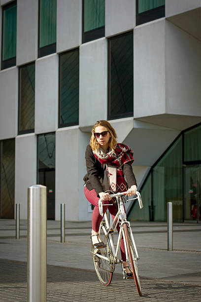 istock City cycling commuting to work infront og an office building 494389082