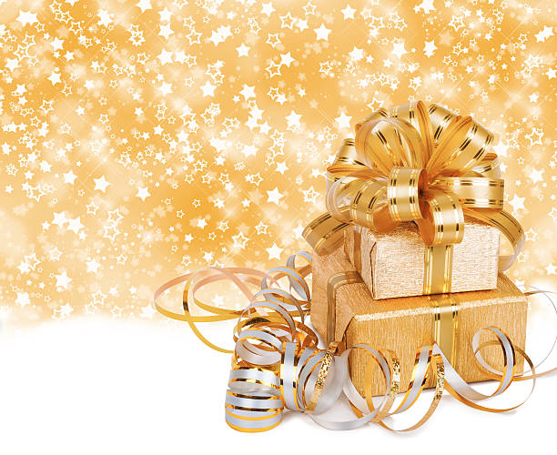 istock Gift box in gold wrapping paper on a beautiful  background 494394721