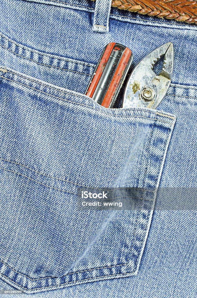 Jeans tasca posteriore e strumenti - Foto stock royalty-free di Abbigliamento casual