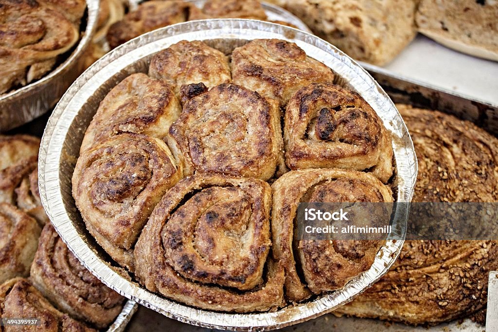 Big poppy seed muffin in an aluminum plate Big poppy seed muffin in an aluminum plate in Turkish bakery Börek Stock Photo