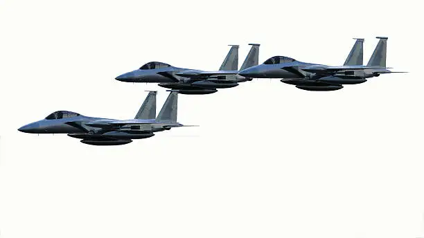Three F-15 Military jets fighter planes isolated on white
