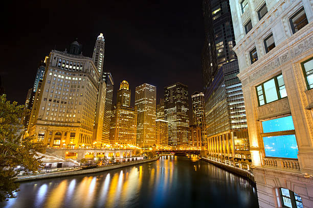 istock Chicago cityscape and river at night 494397361