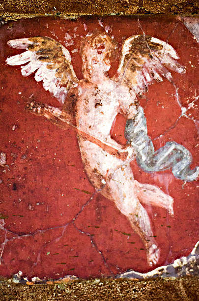 istock Fresco in Pompeii with cupid on a red background 494397533