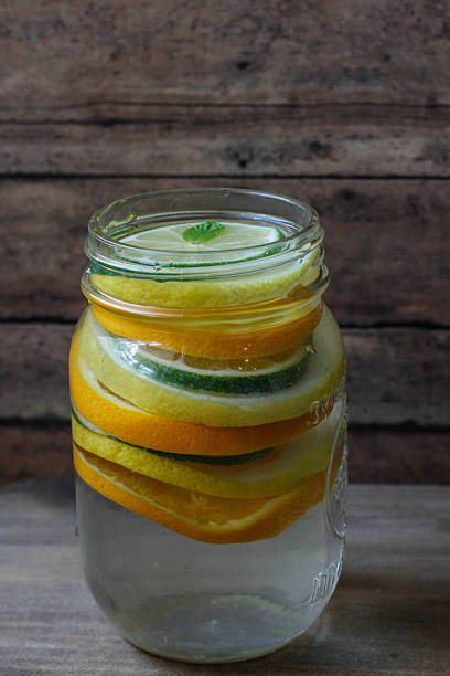 istock Stack of Citrus Slices with Water in Mason Jar 494399193