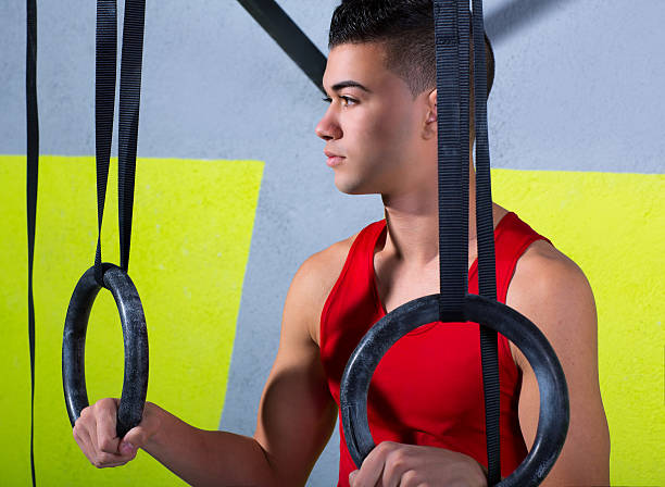 istock gym dip ring young man relaxed after workout 494399647