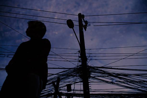 istock silhouette of electricity post 494399933