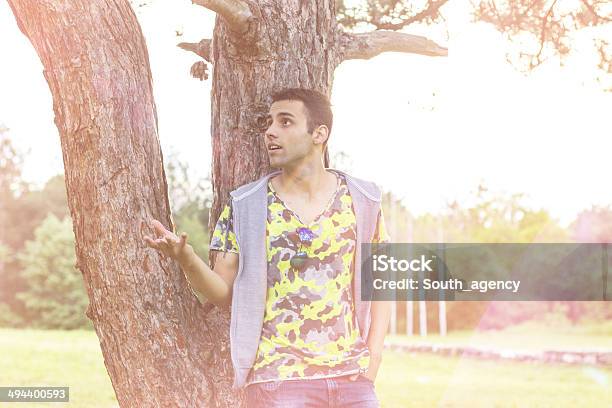 Happy Young Man Relaxing Stock Photo - Download Image Now - Adult, Beautiful People, Boys