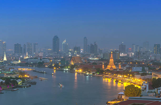 istock Bangkok cityscape at twilight which close up wat arun 494400813