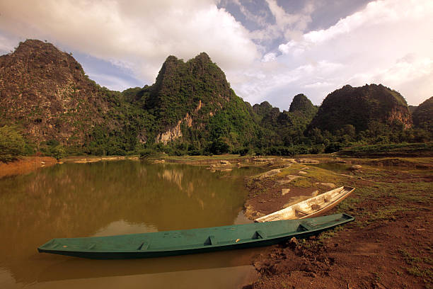 The hilly landscape on the country road 12 between the city of Tha Khaek and the village of Mahaxai Mai in central Laos on the border with Thailand in South East Asia.