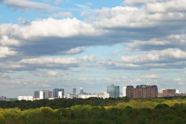 istock shadow of grey clouds on city in spring 494401337