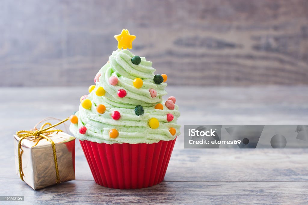 Cupcake with Christmas tree shape 2015 Stock Photo