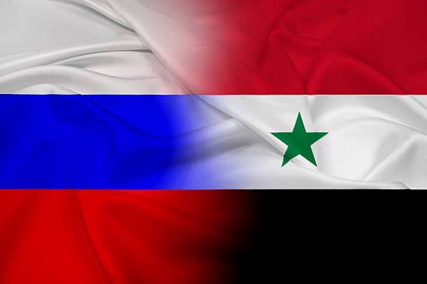 istock Waving Russia and Syria Flag 494412271