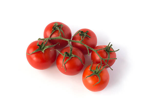 istock Branch of tomatoes isolated on white 494412550