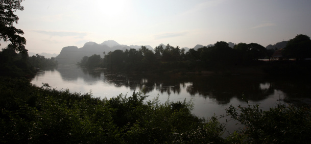 The landscape on the Xe Bang Fai River near the village of Mahaxai Mai from Tham Pa Fa not far from the city of Tha Khaek in central Laos on the border with Thailand in South East Asia.
