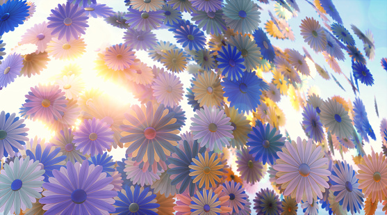 An expanding bundle of confetti flowers on a bright sunny background.