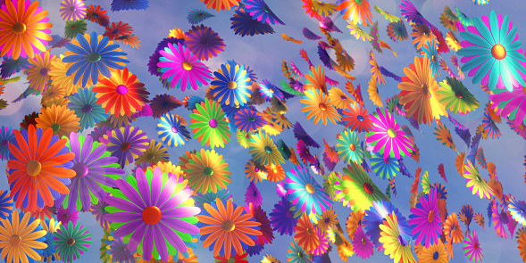 A bunch of colorful confetti flowers flying through a sky background
