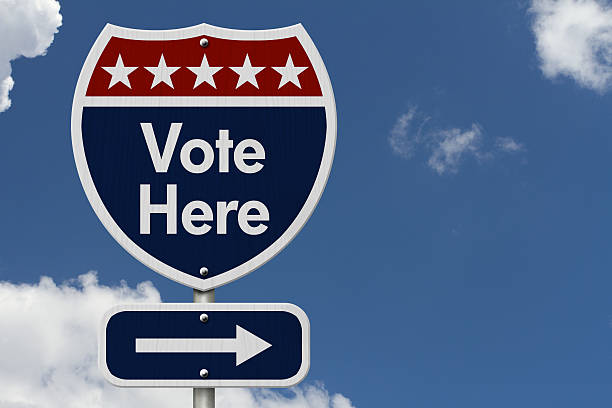 istock American Vote Here Highway Road Sign 494415560