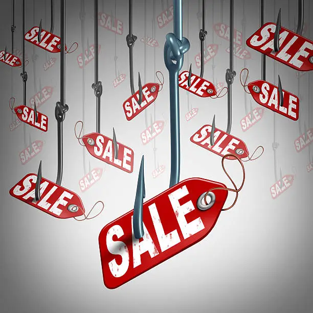 Price incentive retail business concept as a group of fishing hooks with a sale price tag bait attached to the lure as a shopping symbol for promoting attracting and tempting buying clients to be tempted by bargain prices.