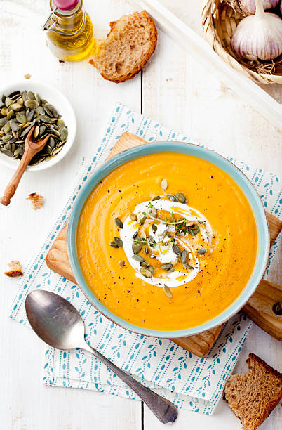 istock Roasted pumpkin and carrot soup with cream . 494419102