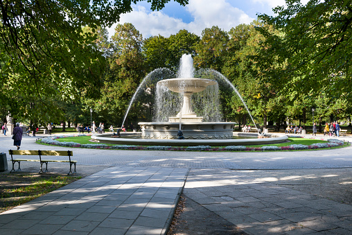 Warsaw, Poland - September 27, 2015: Historic fountain in Saski park (Saxon Garden). The fountain is the centrepiece of gardens and one of most precious urban symbols of Warsaw.