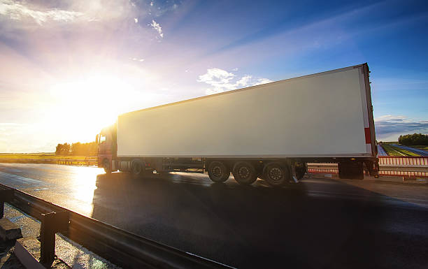 istock truck goes on the highway 494419980