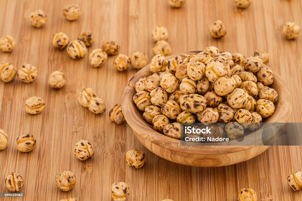 roasted chickpeas in a plate on wooden 2015 Stock Photo