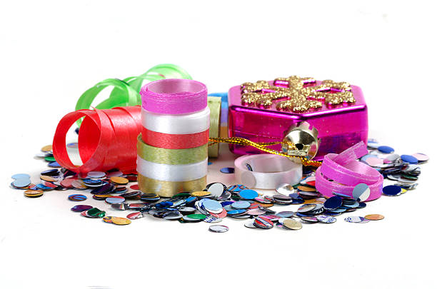 istock Confetti, streamers and Christmas tree toy on a white background 494422574