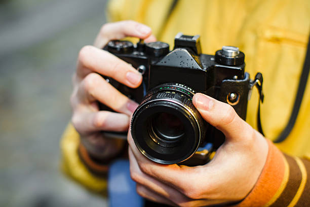 istock hipster and film camera 494424840