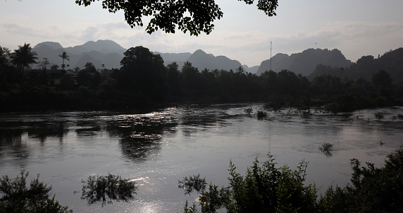 The landscape on the Xe Bang Fai River near the village of Mahaxai Mai from Tham Pa Fa not far from the city of Tha Khaek in central Laos on the border with Thailand in South East Asia.