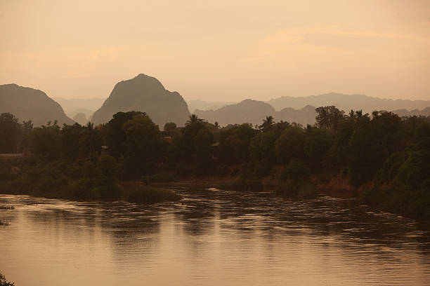 The landscape on the Xe Bang Fai River near the village of Mahaxai Mai from Tham Pa Fa not far from the city of Tha Khaek in central Laos on the border with Thailand in South East Asia.