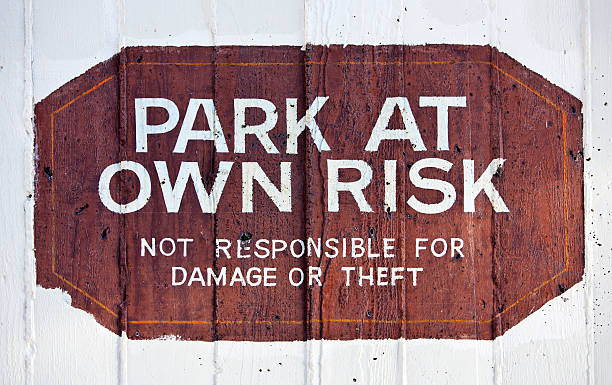 istock Park at Own Risk sign 494431675