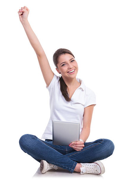 istock casual woman sits, cheers & tablet 494432117