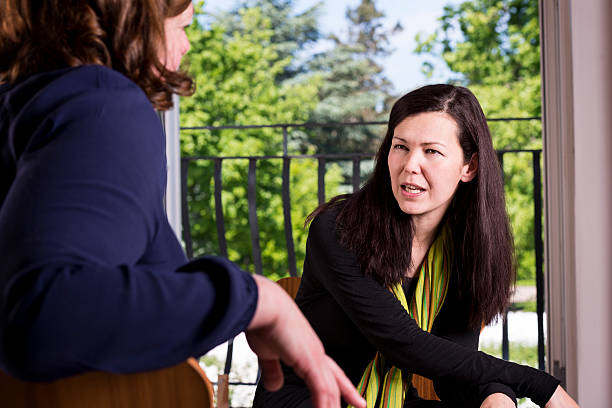 istock Young Woman Talking To a Colleague. 494432475