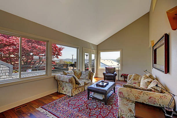 istock Living room with many windows and red rug. 494433001
