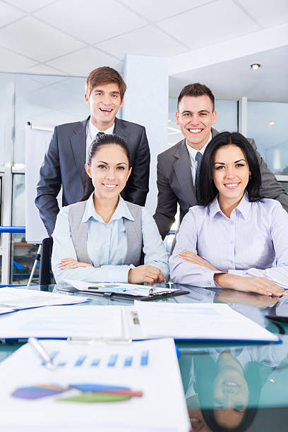 istock business people working at office desk 494433711