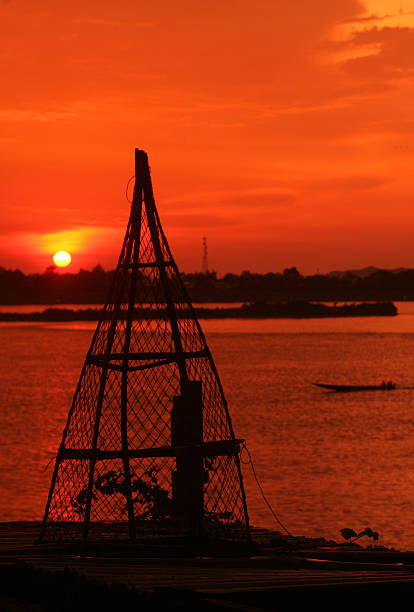 A fishing basket in the landscape of the border river Mekong River in town Savannähet in central Laos on the border with Thailand in South East Asia.