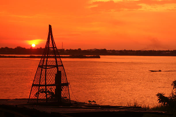 A fishing basket in the landscape of the border river Mekong River in town Savannähet in central Laos on the border with Thailand in South East Asia.