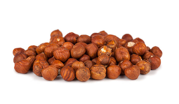 istock Heap of peeled filbert nuts 494436762