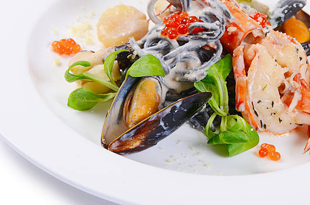 istock The black spaghetti with seafood closeup 494437892