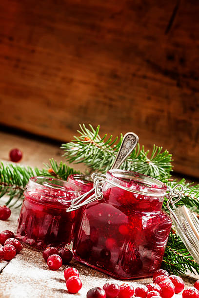 istock Winter cranberry sauce in glass jars 494438304