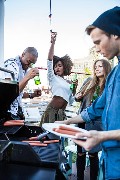 istock Grilling at the rooftop party in New York Manhattan 494438700
