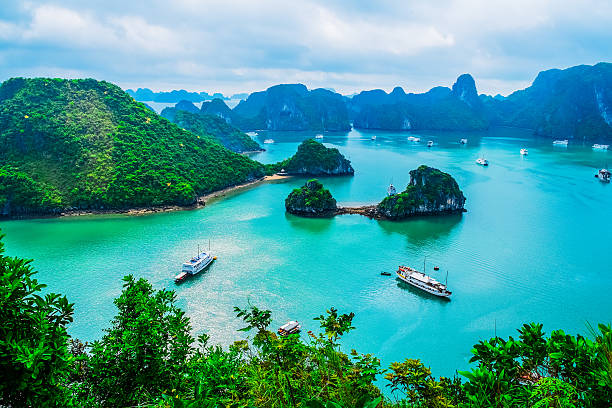 Scenic view of islands in Halong Bay Scenic view of islands in Halong Bay, Vietnam, Southeast Asia gulf of tonkin stock pictures, royalty-free photos & images