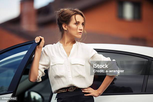 Young Fashion Business Woman Standing Beside Her Car Stock Photo - Download Image Now