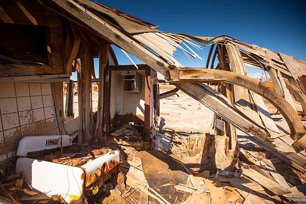 istock Kitchen Appliances Sticking Out of Collapsed House 494444042