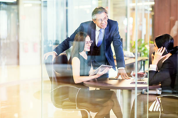 istock Businesspeople having meeting in modern office 494446520