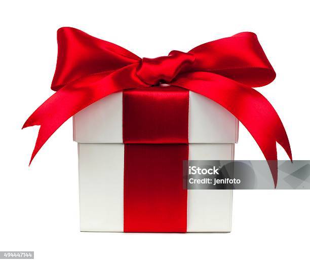 White Gift Box With Red Bow And Ribbon Over White Stock Photo - Download Image Now - Gift Box, Red, Tied Bow