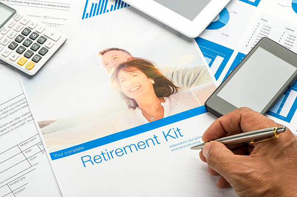 istock Retirement planning kit on a desk with paperwork. 494448524