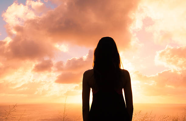 istock Silhouette of lone woman 494449662