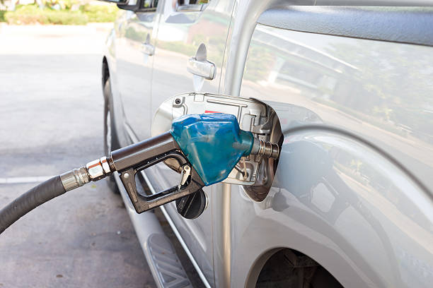 ガスパンプスノズルブルー - gasoline gas station labeling fuel and power generation ストックフォトと画像