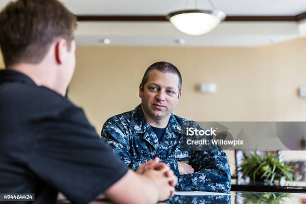 Civilian Teenager Meeting With Us Navy Recruiter Stock Photo - Download Image Now - Military, Civilian, US Navy
